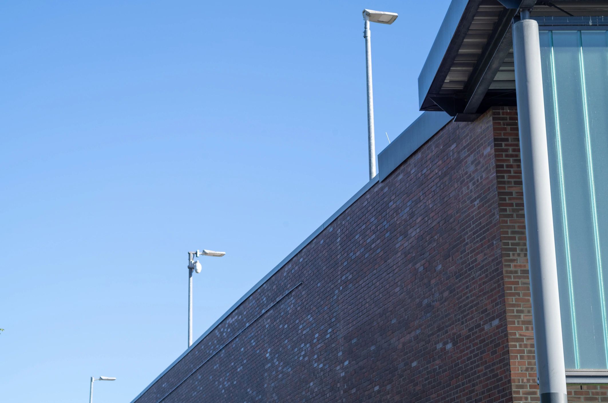 Commercial building exterior with site lighting